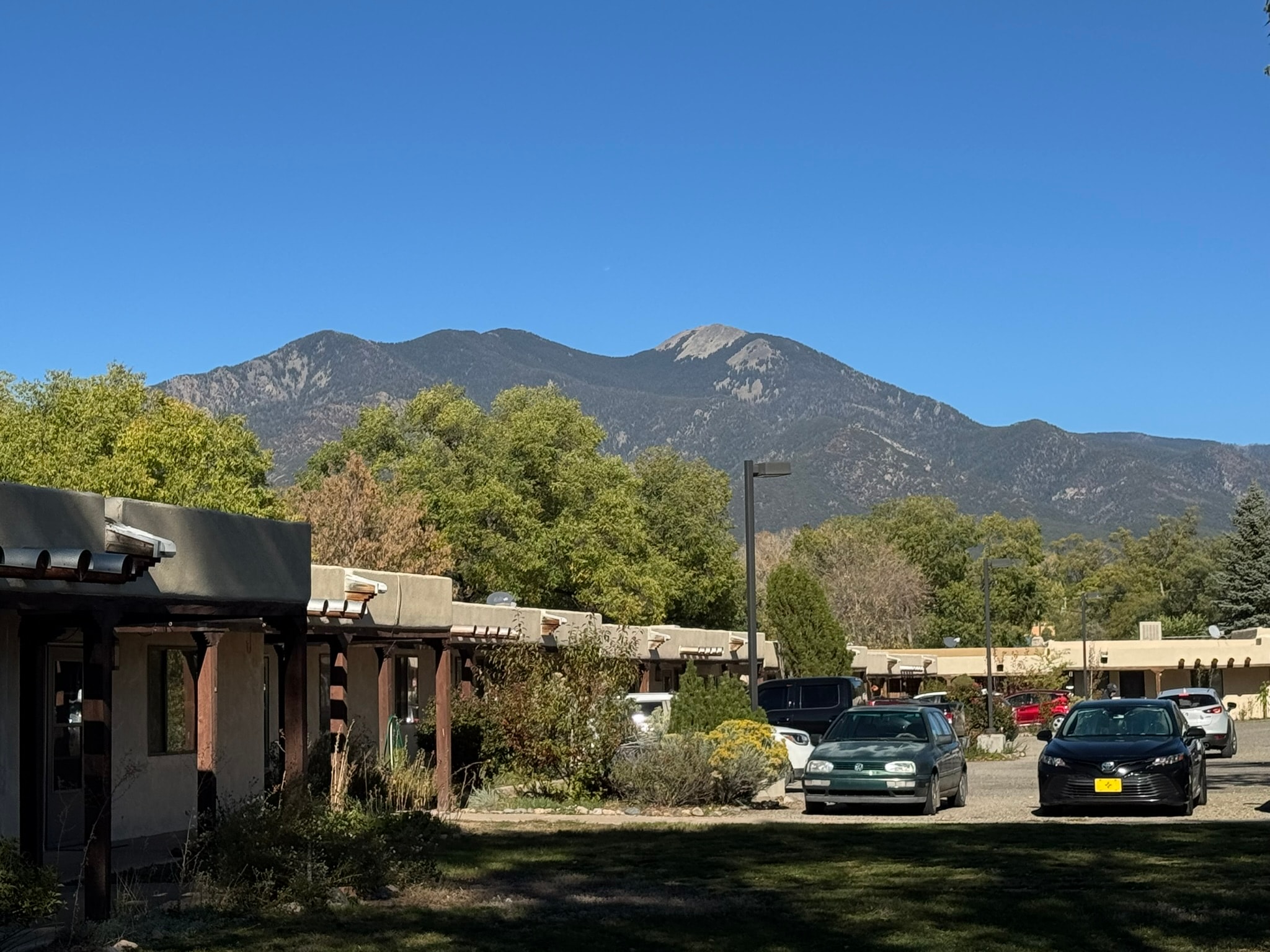 Taos Enchanted Village grounds with the Sangre de Cristo Mountains in the background